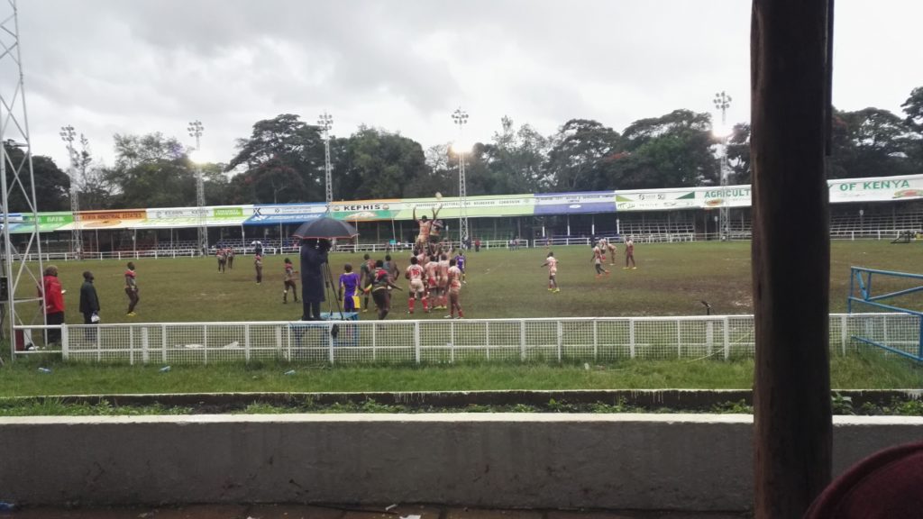 Watching a rainy rugby match in Nairobi